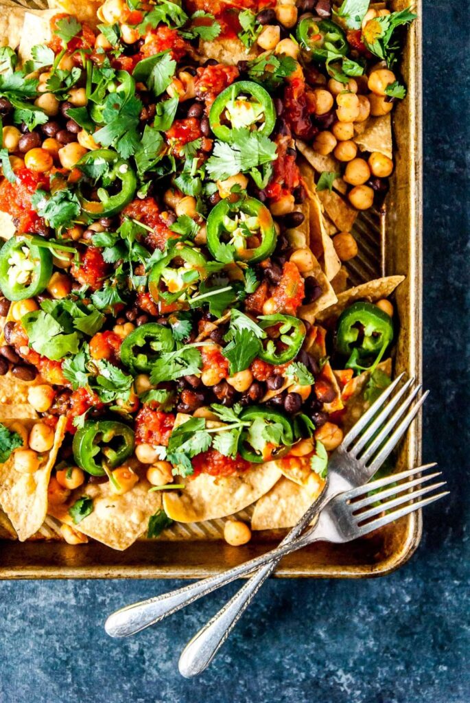 Loaded Vegan Nachos with Black Beans and Spicy Chickpeas