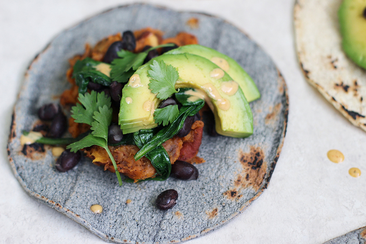 Roasted Yam, Black Bean and Spinach Tacos with Cashew Cream Sauce