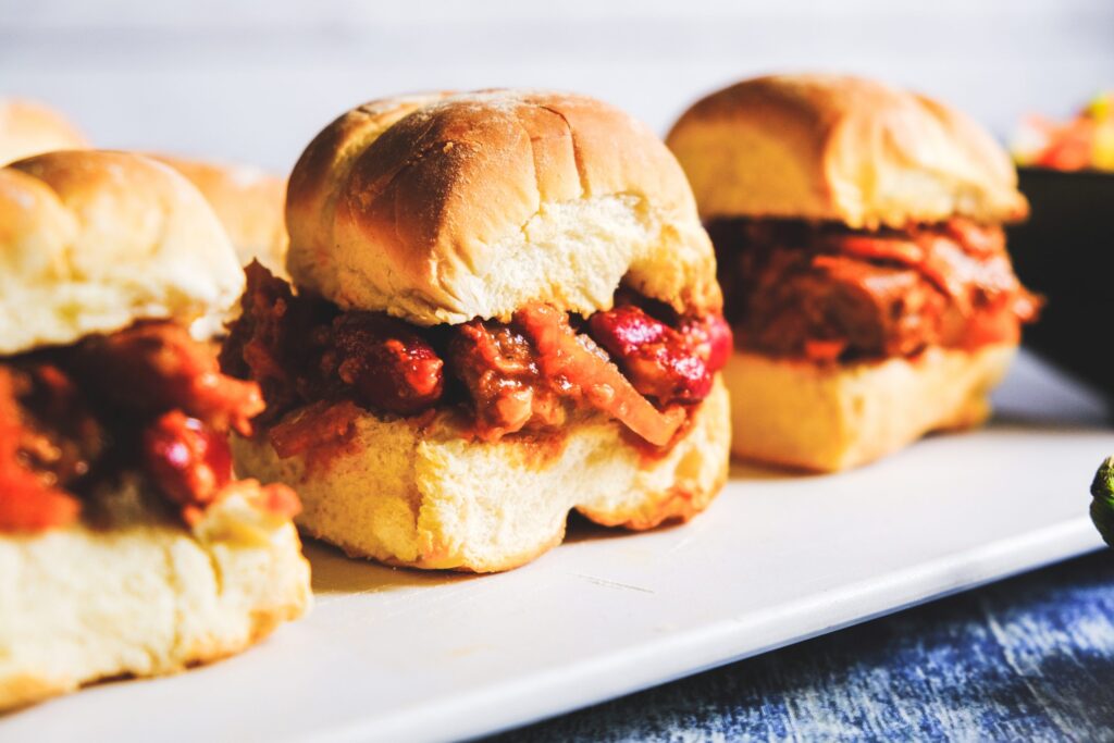 Pulled Pork and Beans Sandwich with Zippy Pineapple Slaw
