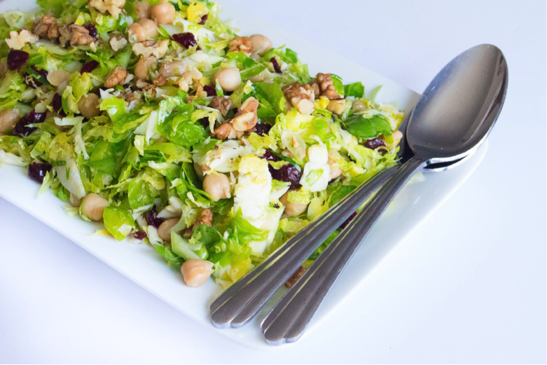 Crunchy Brussels Sprouts and Chickpea Salad with Cranberries and Walnuts